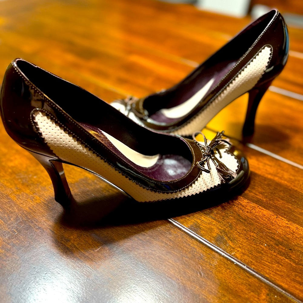 Patent leather wingtip stilettos never worn.
